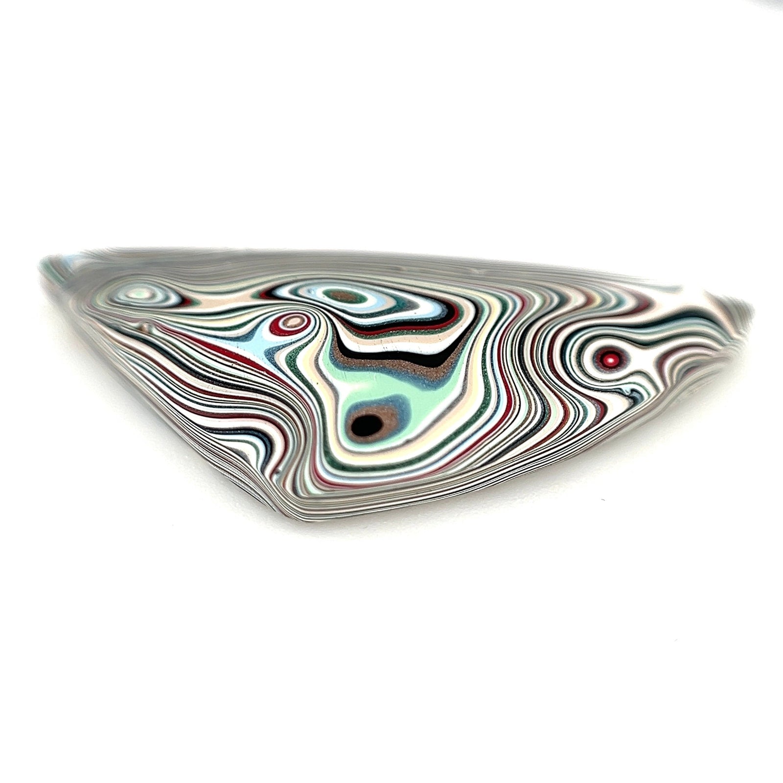 What Is Fordite? The Vintage Car Paint Gemstone That’s No Longer Made