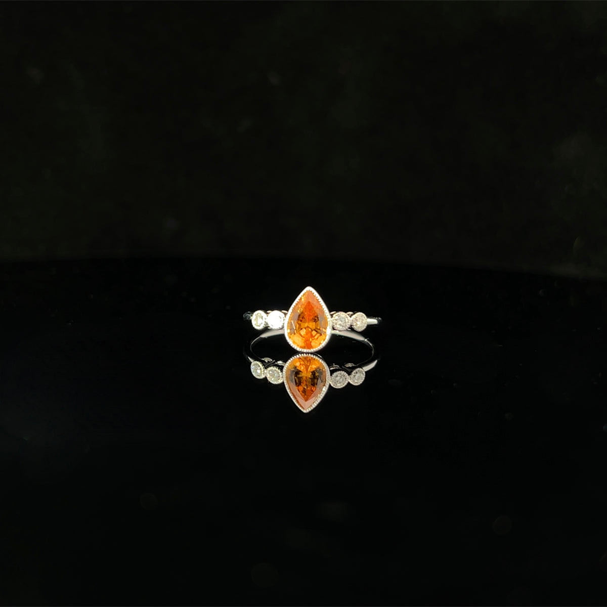 Spessartite and Diamond Ring