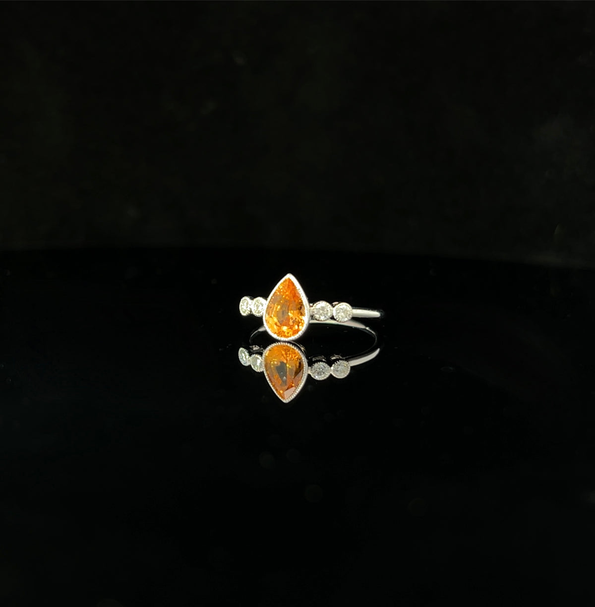 Spessartite and Diamond Ring